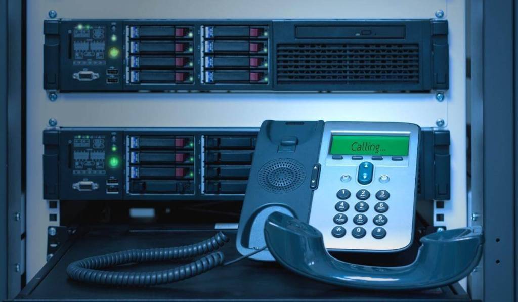 how do phone systems work_voip phone receiving call inside server box, internet, IP Phones