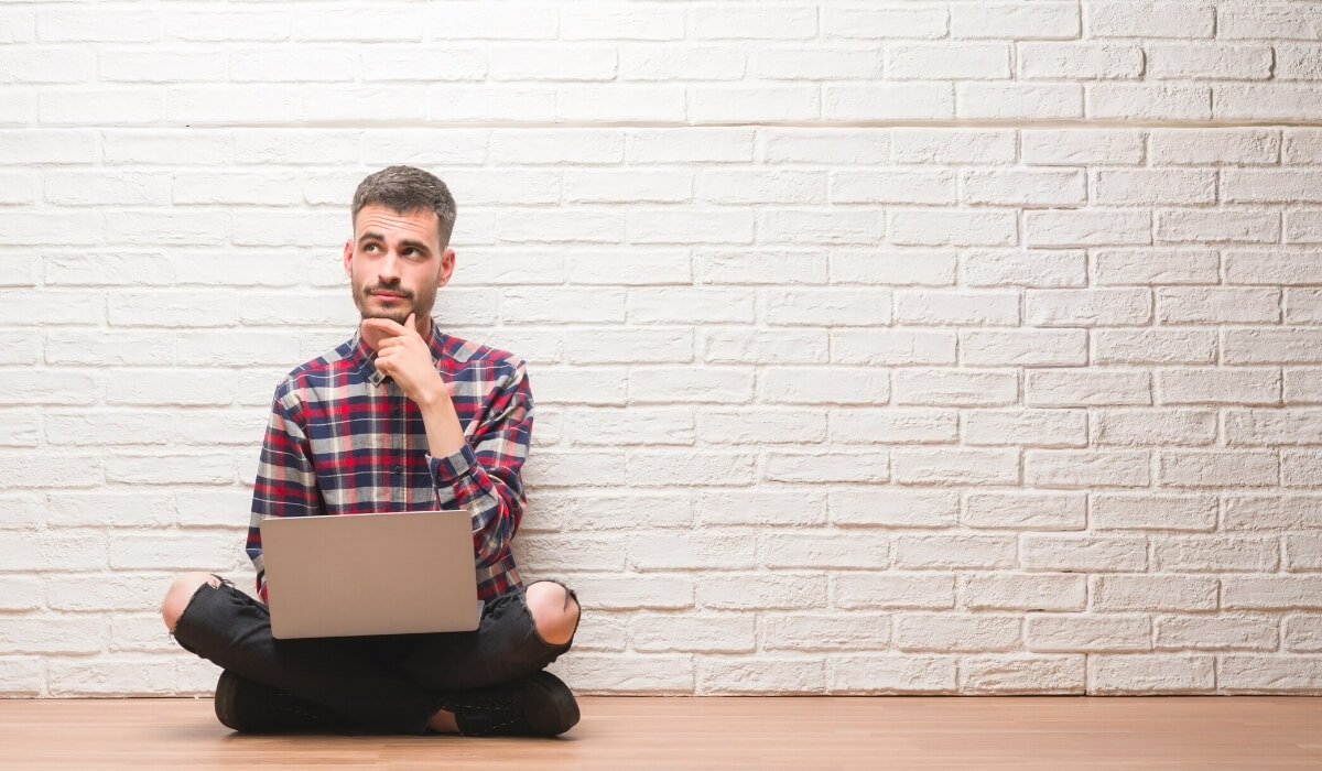 Business owner thinking how many phone lines needed for his business