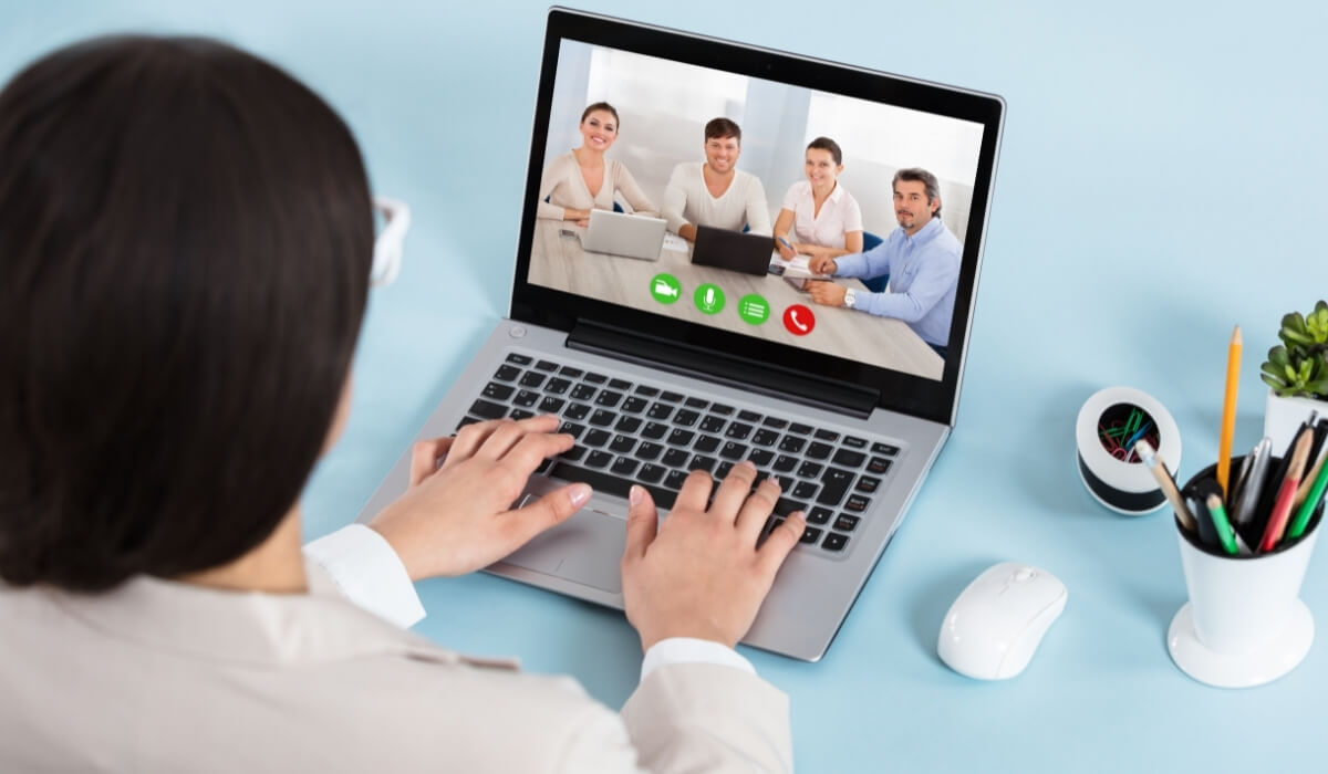 Video Conference example, young woman talking over a virtual meeting