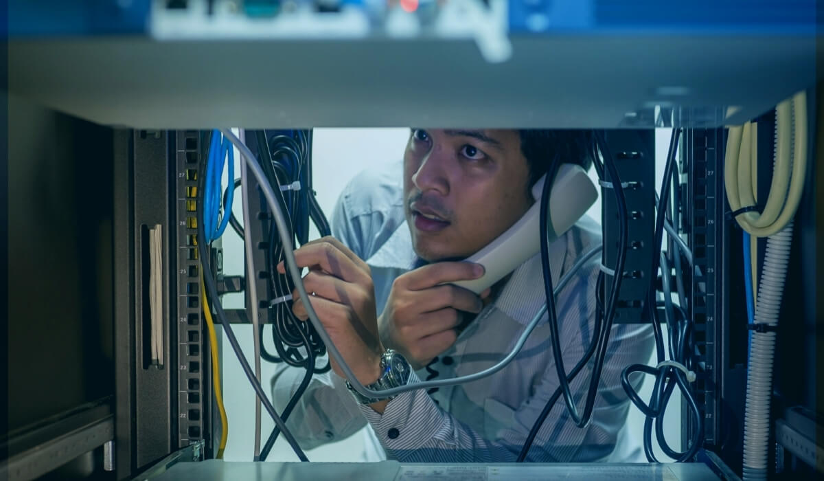 Technician setting up phone systems