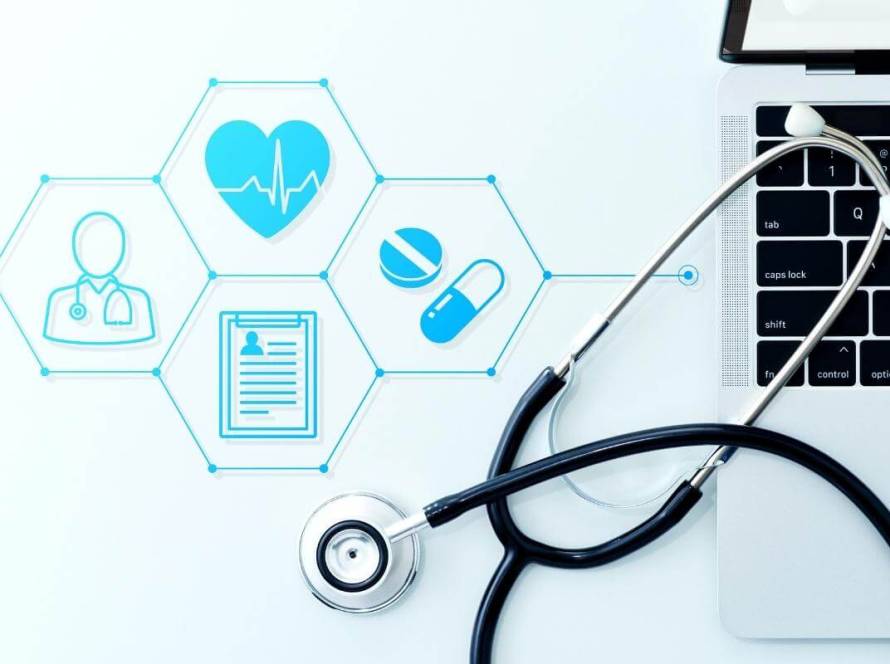 Outsourcing healthcare services pros and cons - Featured Image_Healthcare Technology and telemedicine concept. Stethoscope and laptop on white background with icons related to healthcare, medical billing process, documentation and outsourcing.
