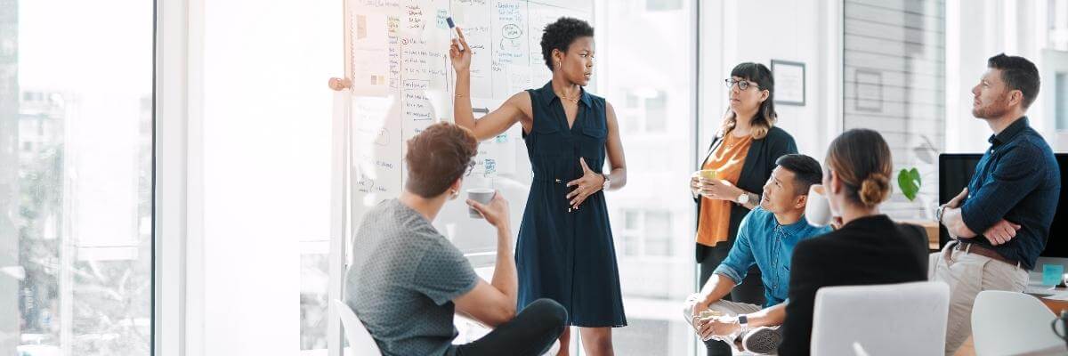 A group of young business professional in a meeting