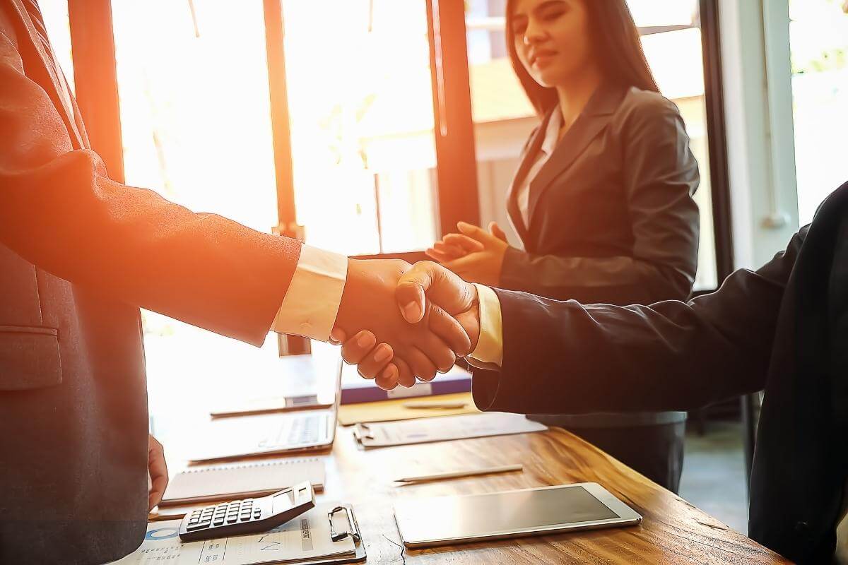 Companies to Outsource Data Entry - Business handshake and people, finishing up meeting