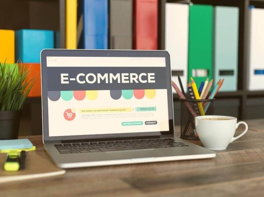 Ecommerce Outsourcing - e-commerce on a laptop screen- online shopping concept