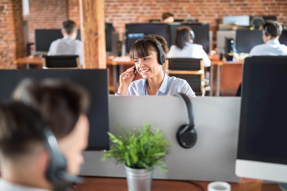 A call center representative working in an office