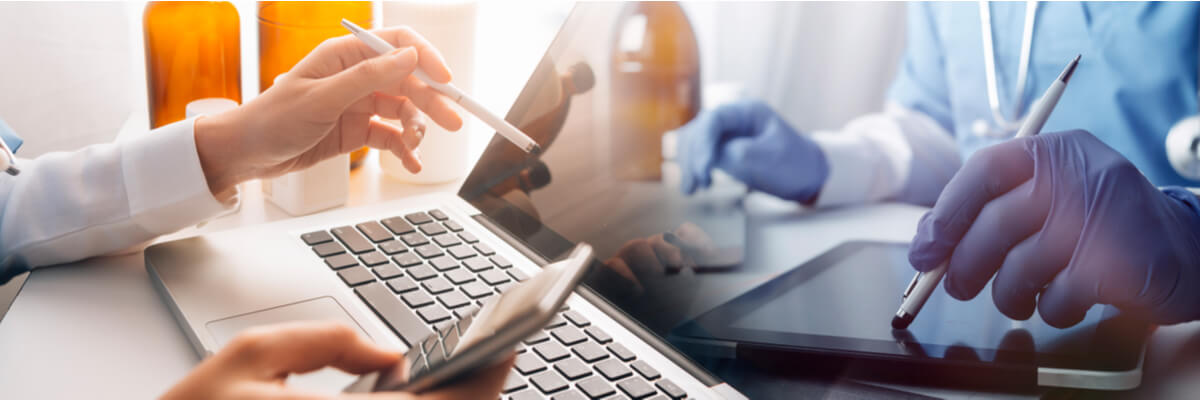 Podiatry Billing and Coding concept. The doctor works with mobile phones, headphones and tablets. Digital laptop Pressing the calculator in the modern office at the hospital in the morning