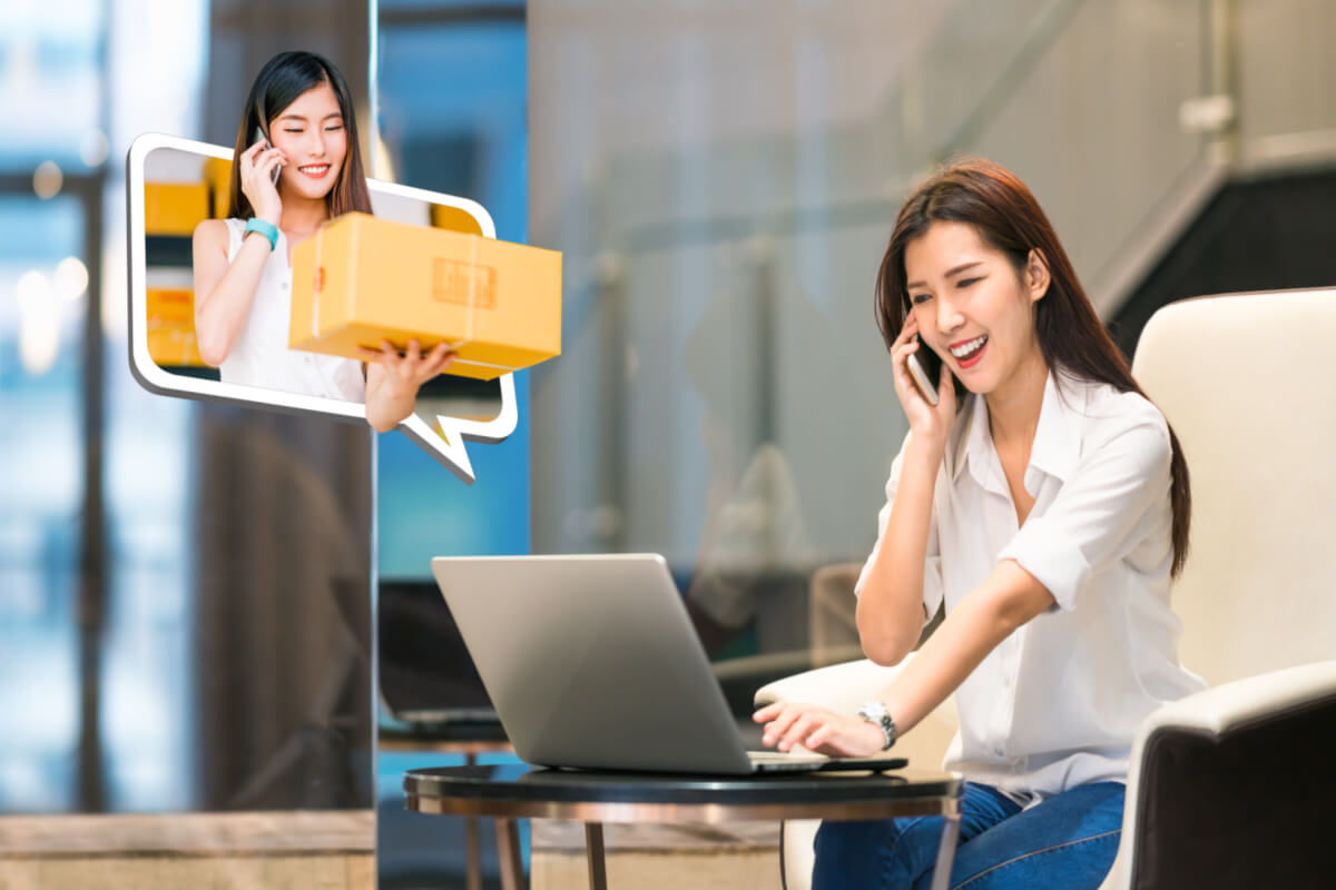 Beautiful Asian girl shop online using phone call with female small business owner delivering parcel box. Internet shopping lifestyle, Ecommerce shipment service
