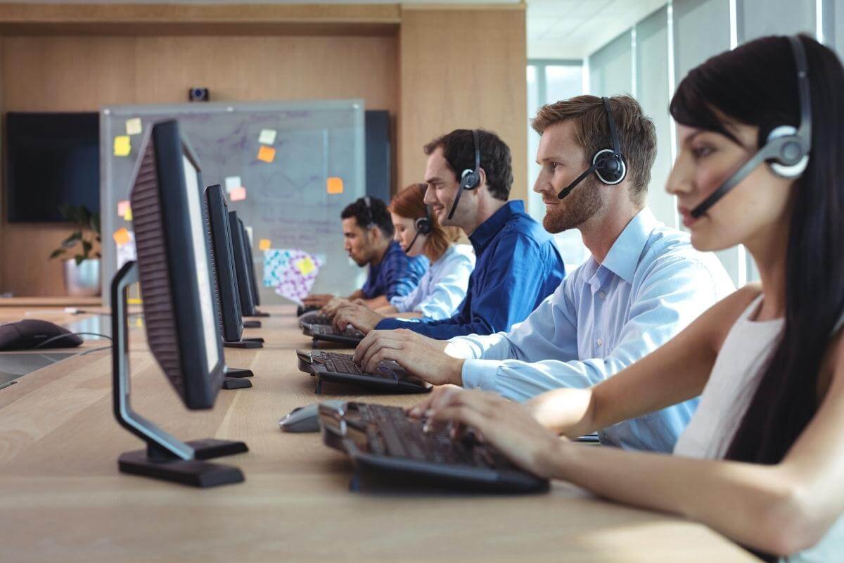 Young people working at a call center for an online store.