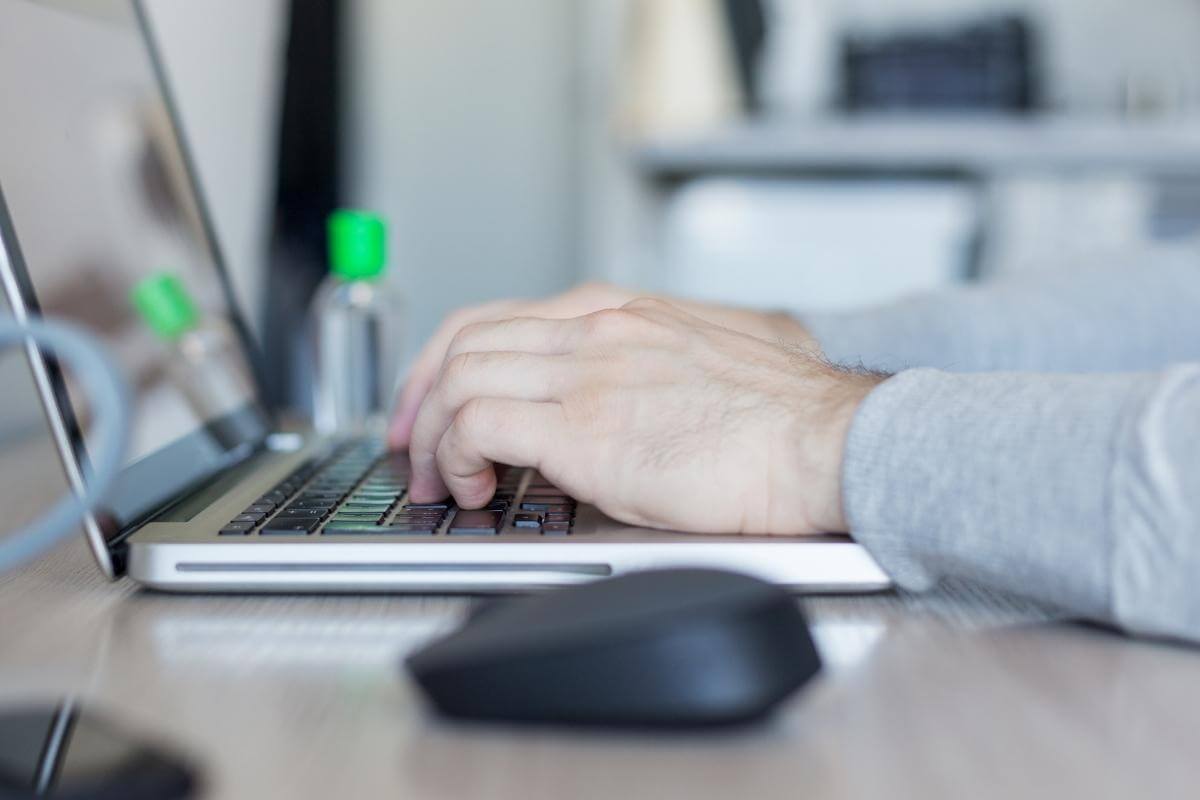 What an External Billing Company Can Do for Your Oncology Practice - image shot of a medical coder working on his laptop