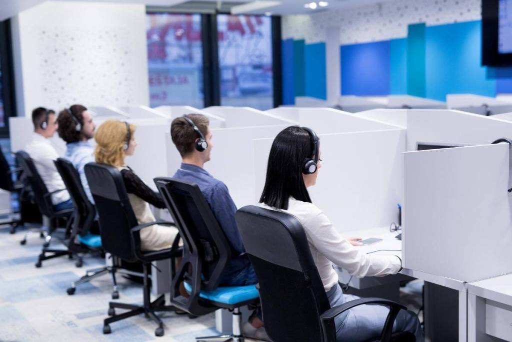 E-commerce Call Centers - call center operators working in an office