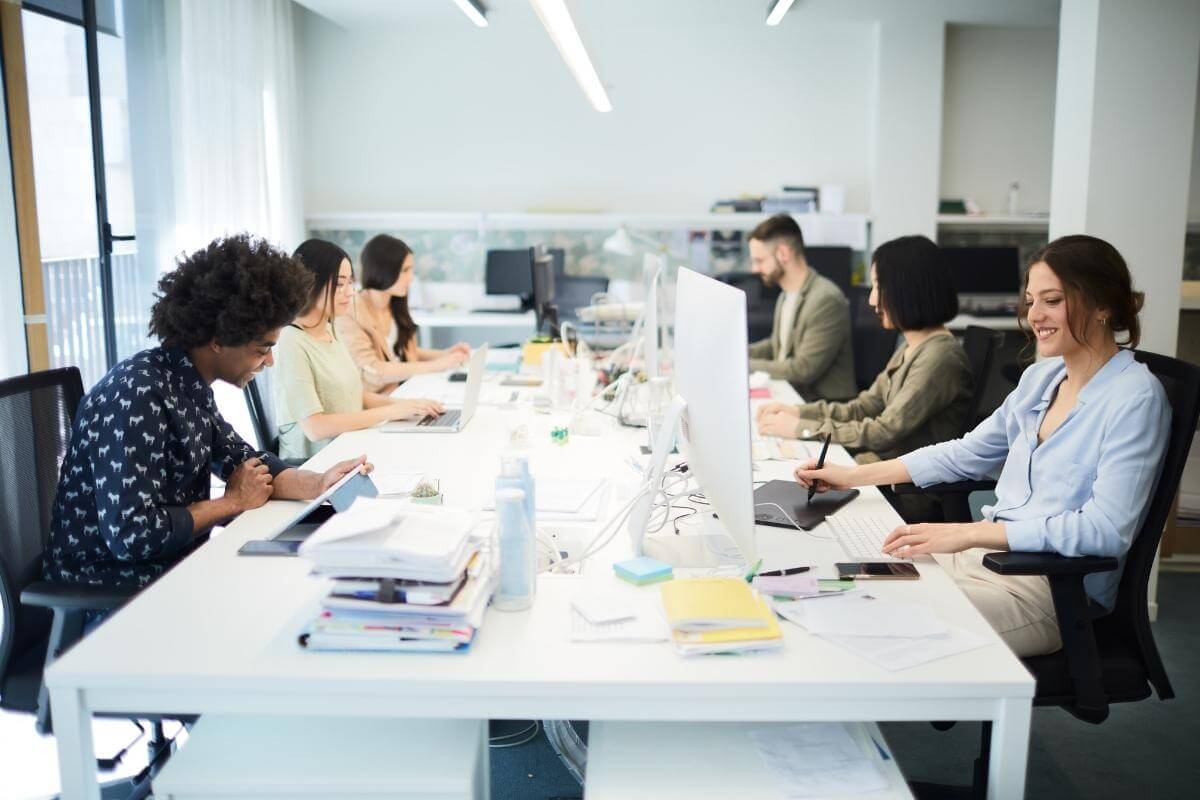 Business office - group of young people working. 