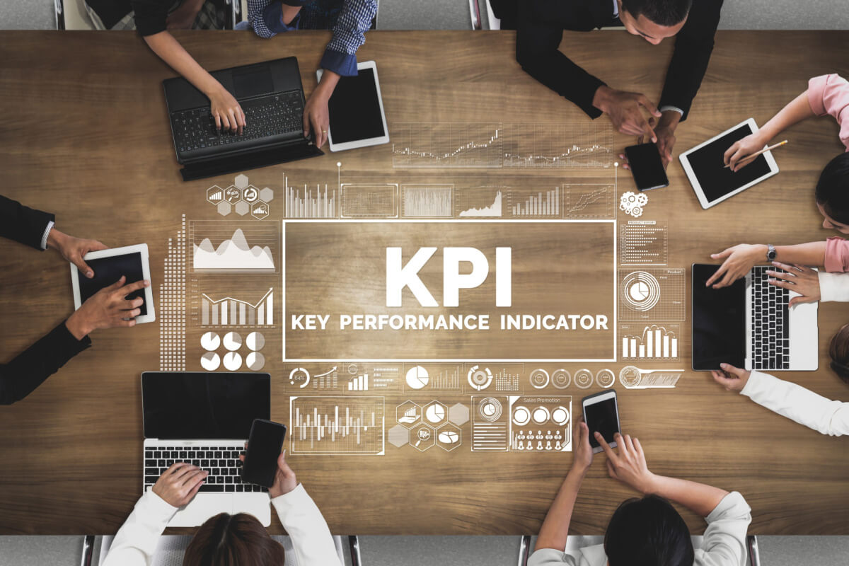 KPI Key Performance Indicator for Business Concept - Modern graphic interface showing symbols of customer service target evaluation and analytical numbers for outsourcing KPI management.