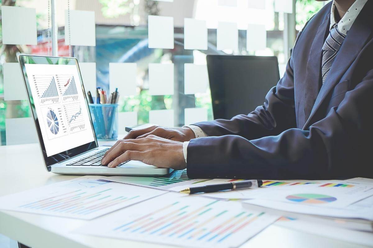 Image view of a business man discussing data at a meeting. 