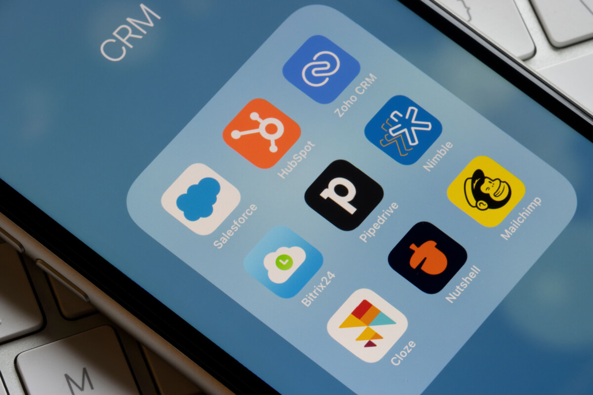 Portland, OR, USA - Mar 28, 2021: Assorted CRM mobile apps are seen on an iPhone - Salesforce, HubSpot, Zoho CRM, Bitrix24, Pipedrive, Nimble, Cloze, Nutshell, and Mailchimp.