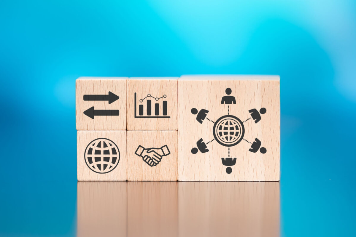 Wooden blocks with symbol of bpo concept on blue background