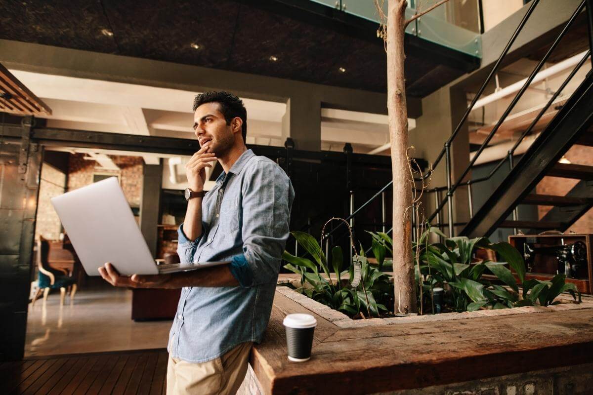 Young business man thinking of strategy, marketing and outsourcing 