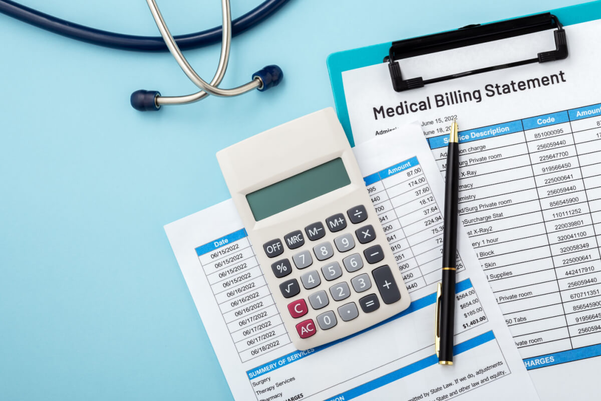 Calculator on medical billing statement with pen on blue background, concept of healthcare finance, cost, medical billing and insurance