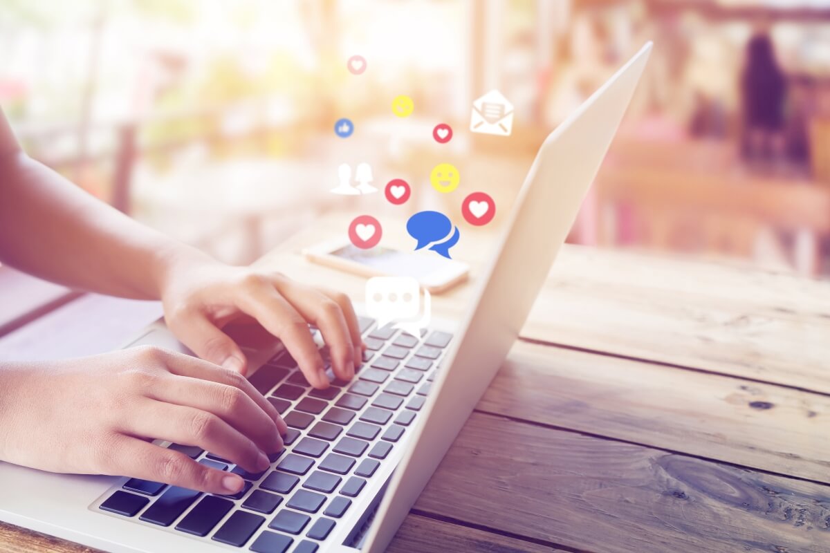 What Are Contact Centers - Image shot of a woman typing in her laptop