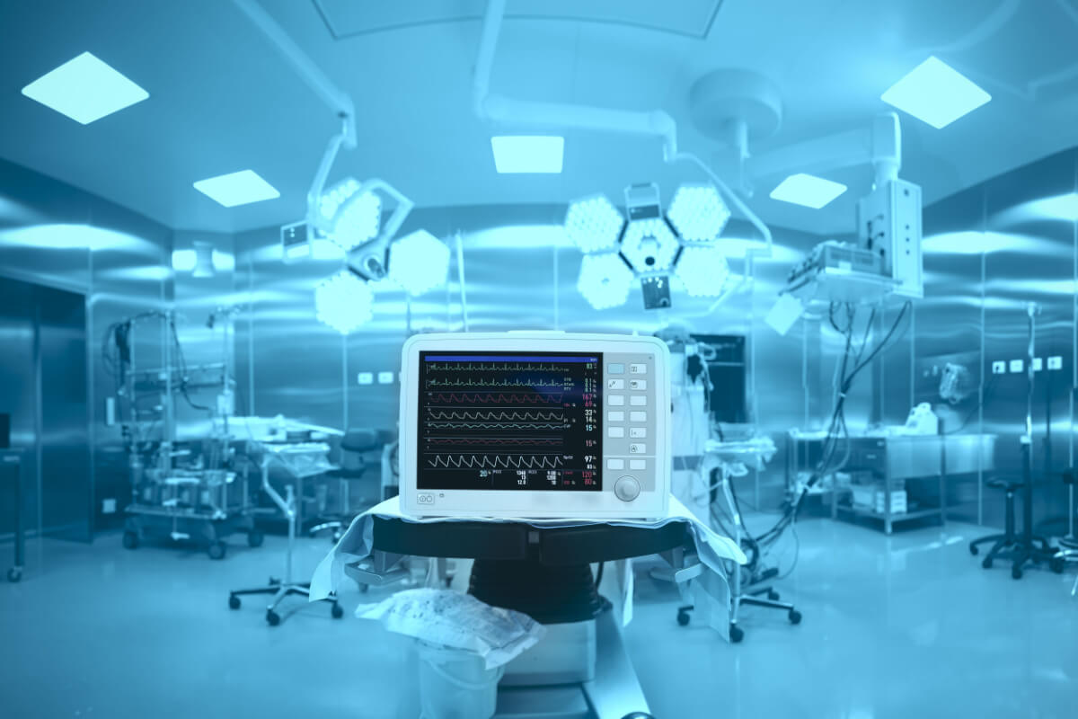 Innovative technology in a modern hospital operating room. Outsourcing allows for more budget to be allocated to the right initiatives. Benefit of outsourcing, hospital, technology