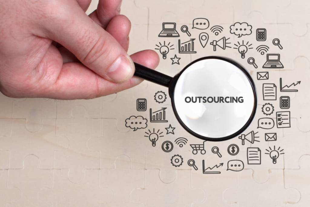 What Is Healthcare BPO_Business, technology, internet and network concept. Young businessman thinks over the steps for successful growth: Outsourcing