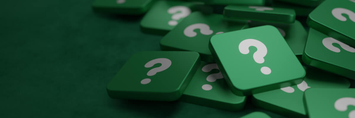 Why Invest in a Contact Center_Green question mark on a background of white signs Concept of Asking Seeking for Knowledge